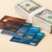 Clean financial scene with stacked credit cards, cash bundles